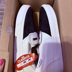 Vans Classics Black and White Slip-Ons